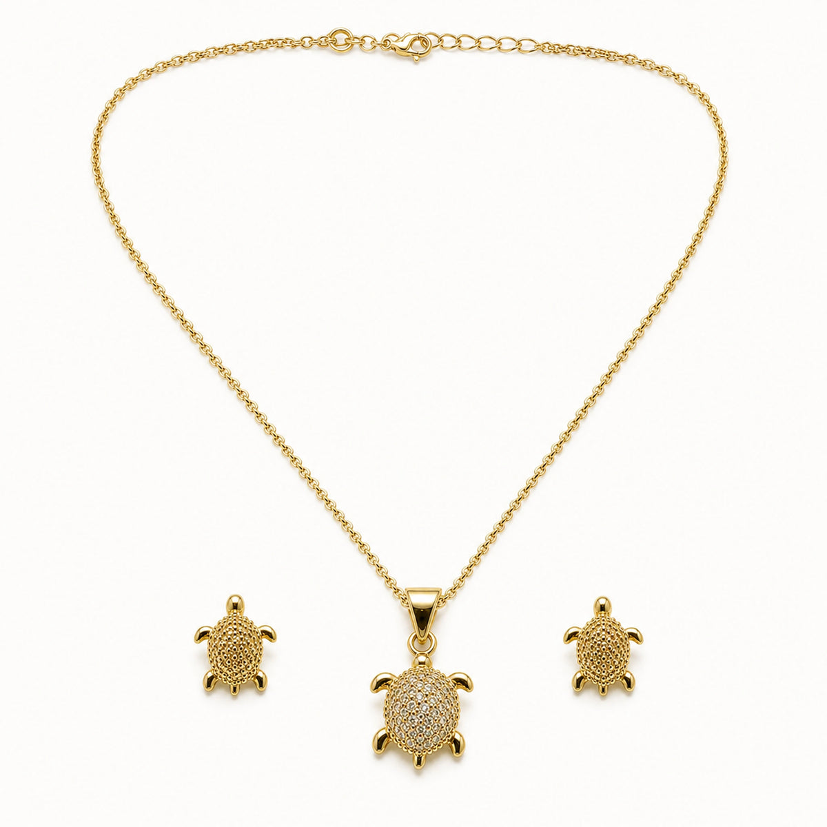 Set Tortuga: collar con dije de tortuga y dos aretes a juego.