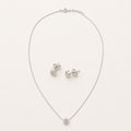 Set Claro: collar y dos aretes en plata Ley 925 con elemento transparente.