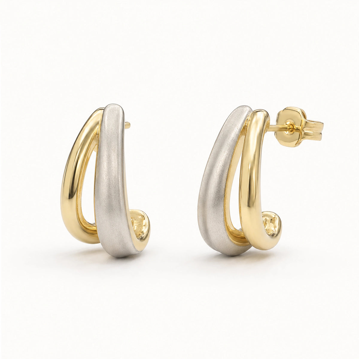 Aretes Abrazo: mini aro abierto bicolor.
